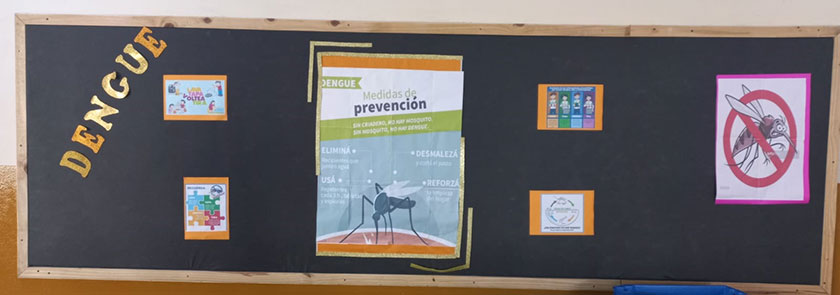 pizarra con información sobre el dengue